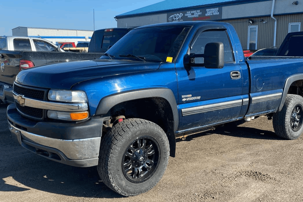 Chevy truck repair in Palmerston, ON, at CDP Diesel & Auto INC. Image of a Chevrolet Silverado 2500HD receiving professional diesel maintenance and repair services to improve towing performance, reliability, and heavy-duty truck capability.