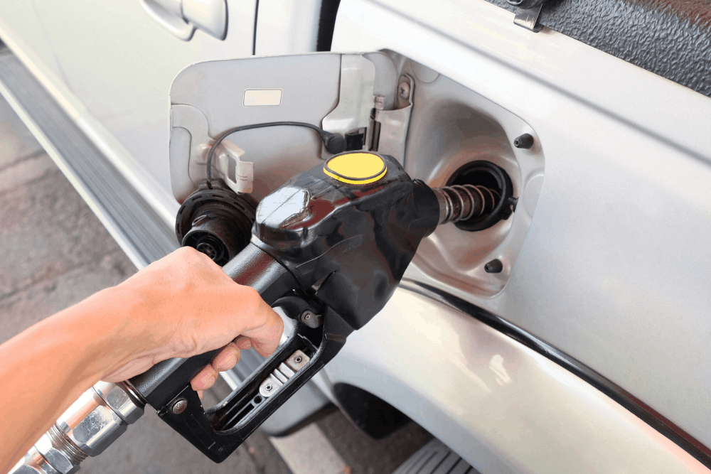 Fuel efficiency, diesel repair in Palmerston, ON, at CDP Diesel & Auto INC. Image shows a diesel or gasoline truck being refueled as part of proper vehicle care and preventative maintenance.