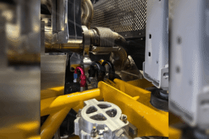 Fuel system cleaning, diesel repair in Palmerston, ON at CDP Diesel & Auto INC. Image of custom fuel lines, hoses, fittings, and diesel engine components inside a modified vehicle during service.